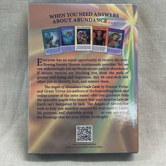 Back cover of an oracle card deck with the words "When you need answers about abundance" at the top, pictures of 5 different oracle cards, and a text description of the deck on a multicolor background