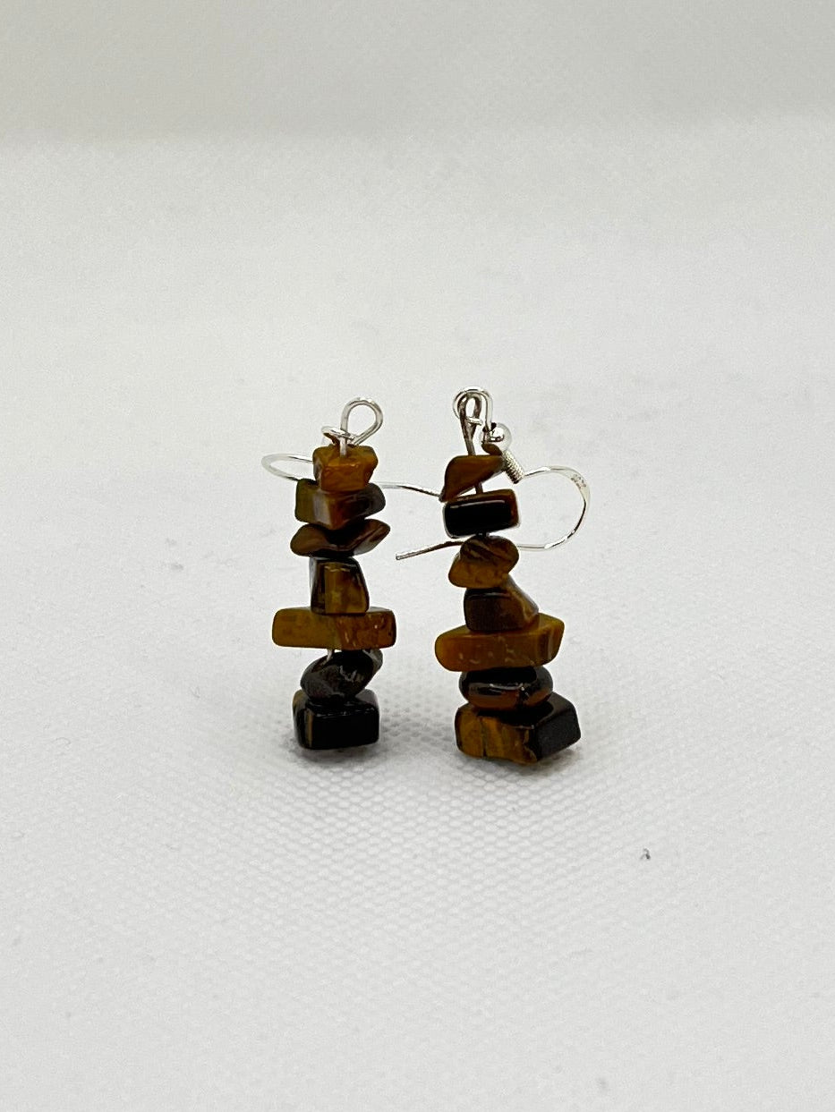 Brown and black irridescent earrings made of chips of tigers eye crystals. 