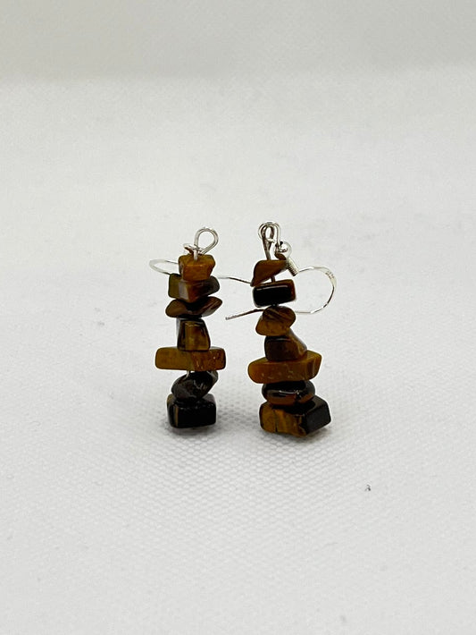 Brown and black irridescent earrings made of chips of tigers eye crystals. 