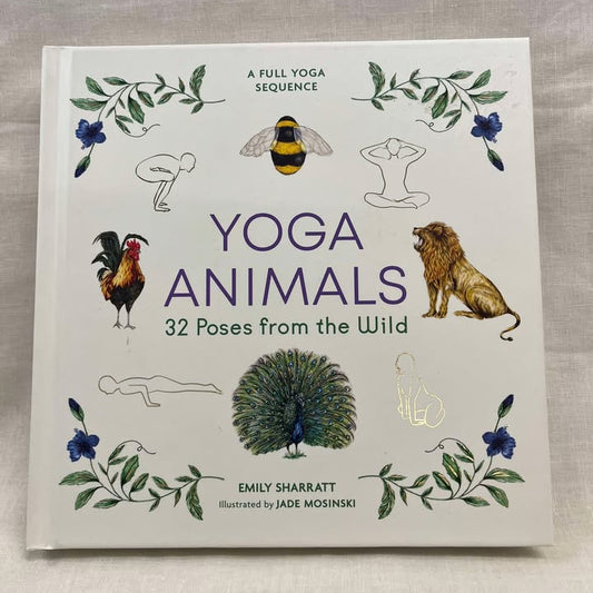 Book titled 'Yoga Animals: 32 Poses from the Wild' by Emily Sharratt on a light cream background, with a rooster, bee, lion, and peacock as well as 4 basic line drawings of people in yoga poses, as well as flowers on a leafy stem on each corner.